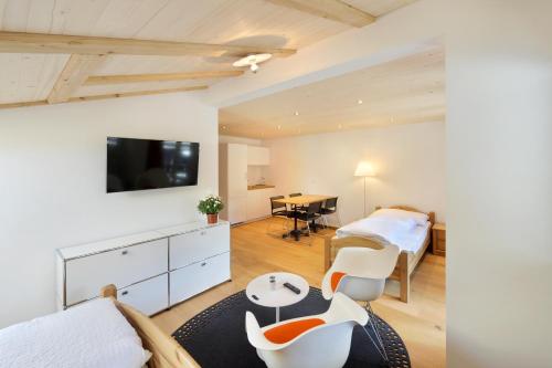TV a/nebo společenská místnost v ubytování Hotel-Restaurant zum Gade