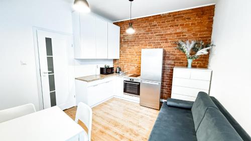 Kuchyň nebo kuchyňský kout v ubytování Nawrot Hideaway By DreamAp