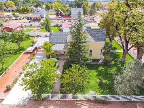 an aerial view of a small town with a white fence at Stunning Historic Home Lots of Space In Town in Kanab