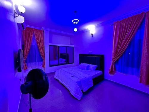 Ένα ή περισσότερα κρεβάτια σε δωμάτιο στο Abuja Municipal Luxury Home