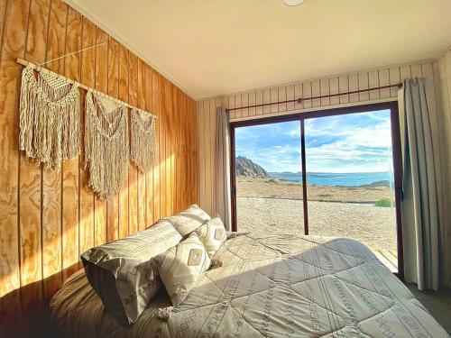 Postel nebo postele na pokoji v ubytování Casa Puntalodge