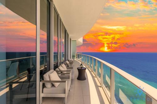 a view of the ocean from the balcony of a cruise ship at Oceanfront Penthouse -3BR + Pool + Beach access in Hollywood Beach