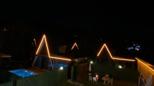 Πισίνα στο ή κοντά στο Bungarella Deluxe Bungalows