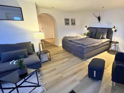 Postel nebo postele na pokoji v ubytování Apartment Eifelglück with roof terrace