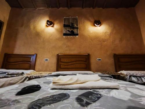 Ένα ή περισσότερα κρεβάτια σε δωμάτιο στο El Dorado Camp