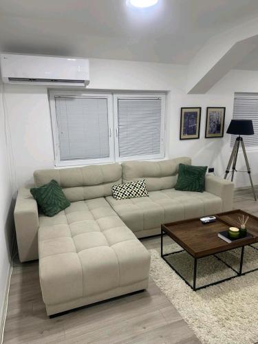 Posezení v ubytování Apartman Centar-moderan dvosoban stan u centru