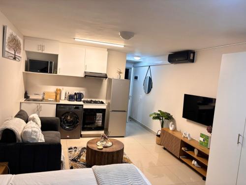 Kuchyň nebo kuchyňský kout v ubytování Short right corner