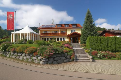オーバーロイテにあるHotel JMS Holiday Allgäuの旗の大家