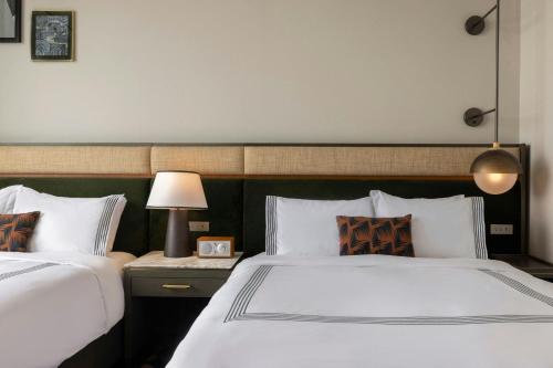 Ένα ή περισσότερα κρεβάτια σε δωμάτιο στο The Tess, Autograph Collection