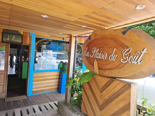 a store with a sign that reads our manakin do salt at Les Gites de Kribi in Kribi