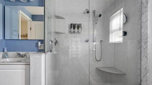 a bathroom with a shower and a sink at Newport Beach House with Huge Yard in Middletown