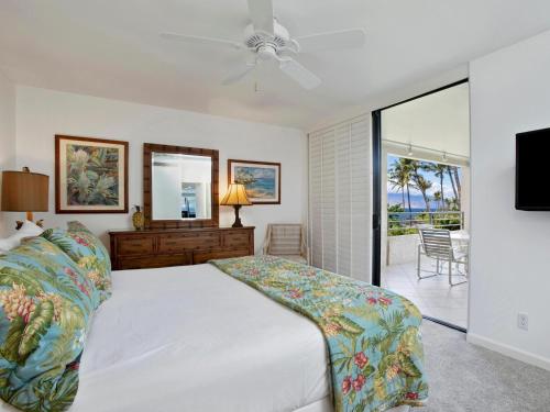 En eller flere senge i et værelse på Polo Beach Club 407