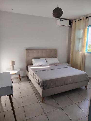 Postel nebo postele na pokoji v ubytování Dorra house