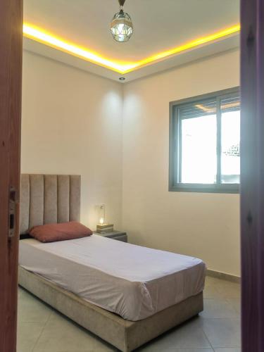 Ένα ή περισσότερα κρεβάτια σε δωμάτιο στο Mydar Airport & Stadium