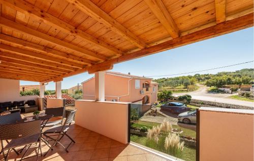a view from the balcony of a villa at One-Bedroom Apartment In Podgradina in Islam Grčki