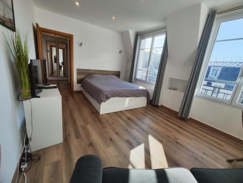 Studio de charme toits parisiens