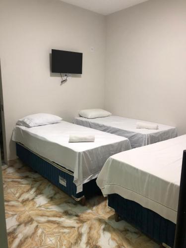 Postel nebo postele na pokoji v ubytování Pousada SB
