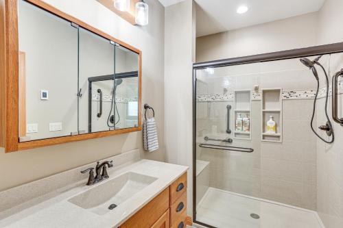 a bathroom with a sink and a shower stall at 6 Mi to Main St Home with Private Patio in Sturgis in Crook City