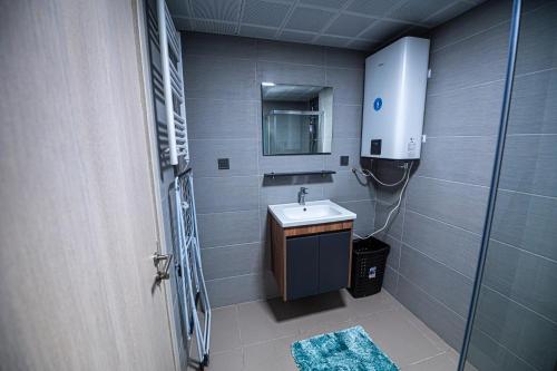 Ένα μπάνιο στο 19th Floor Piano Fitness and Spa Remote Work Apartment