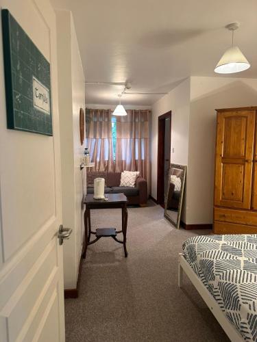 Postel nebo postele na pokoji v ubytování The Killarney Hideaway