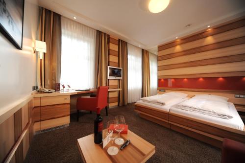 Cama o camas de una habitación en Hotel Torbräu