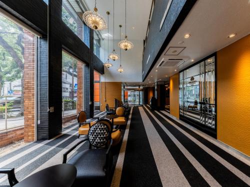 a lobby of a building with a bowling alley at APA Hotel Nagasaki Dejima in Nagasaki