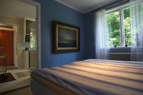 Ένα ή περισσότερα κρεβάτια σε δωμάτιο στο Det gamla bageriet i Moliden