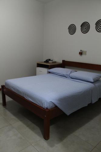 Katil atau katil-katil dalam bilik di Paradise Hotel