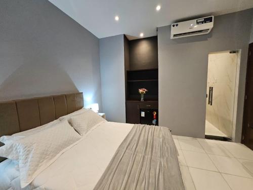 Postel nebo postele na pokoji v ubytování Praculá Hotel