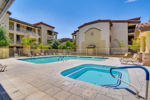 a swimming pool with chairs and a building at 8 Mi to Tonto Natl Forest Desert Oasis with Pool in Mesa