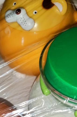 塔伊切Rinconcito Dreams的一个瓶子的特写镜头，瓶子上画着一只熊