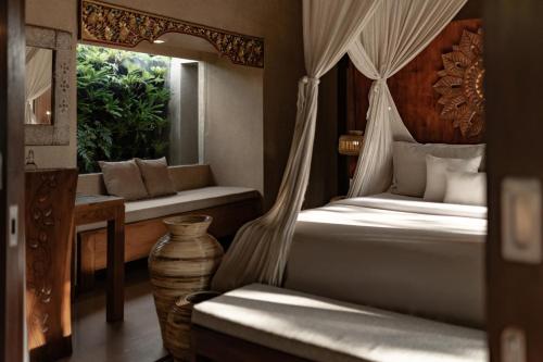 Giường trong phòng chung tại Dedary Resort & Spa Ubud by Ini Vie Hospitality