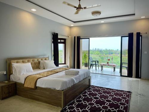 Ένα ή περισσότερα κρεβάτια σε δωμάτιο στο Mountain Breeze