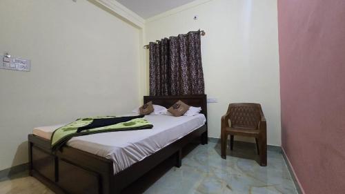 Ένα ή περισσότερα κρεβάτια σε δωμάτιο στο Hk Guest house