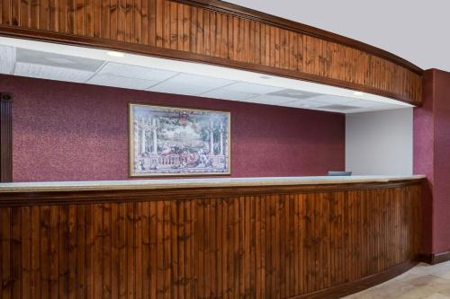 a waiting room with a wood paneled wall at Days Inn by Wyndham St Augustine/Historic Downtown in Saint Augustine