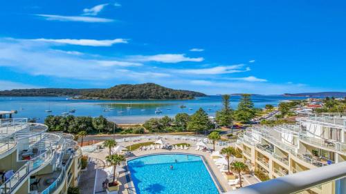 an aerial view of a resort with a swimming pool at Allure in Ettalong Beach