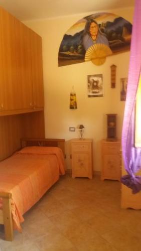 Cama o camas de una habitación en Agriturismo PrimErio