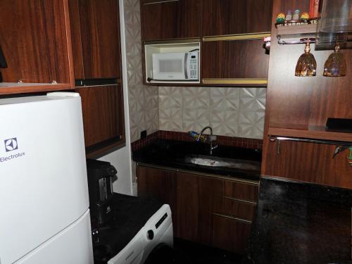 Køkken eller tekøkken på Apê Surpreendente no Coração da Cidade