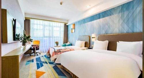 Кровать или кровати в номере Holiday Inn Express Lhasa Potala Square By IHG