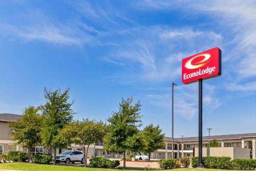 a sign in front of a building at Econo Lodge in Bryan