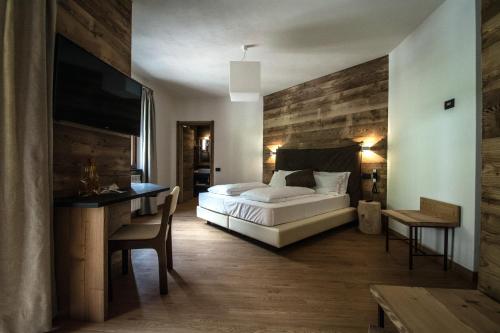 Katil atau katil-katil dalam bilik di Orobie Alps Resort