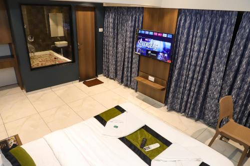 TV a/nebo společenská místnost v ubytování RK Hotel