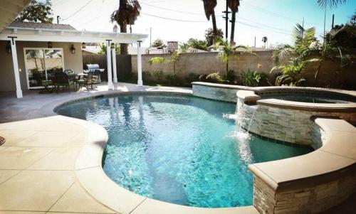 a swimming pool in the backyard of a house at Destination #29 in Anaheim