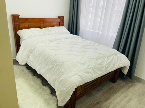 Postel nebo postele na pokoji v ubytování Brooklyn Homes