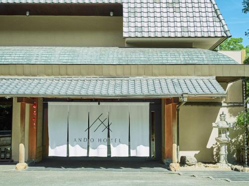 a store front with a sign that reads and no hotel at ANDO HOTEL NARA Wakakusayama -DLIGHT LIFE & HOTELS- in Nara