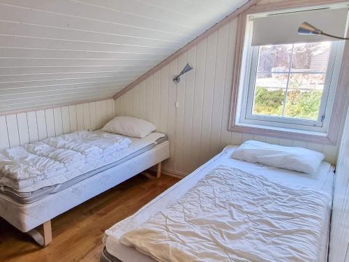 Ένα ή περισσότερα κρεβάτια σε δωμάτιο στο 8 person holiday home in ÅSERAL