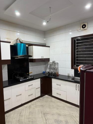 Kuchyň nebo kuchyňský kout v ubytování Chandigarh Green Nook