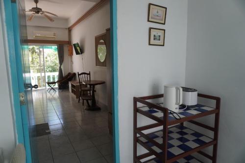 a view of a room with a kitchen and a hallway at Residy Retreat x Baan Suan Villa in Patong Beach
