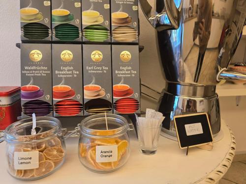 a counter with jars of food and a blender at Alle Porte in Riva del Garda