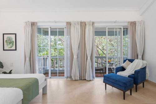 Ένα ή περισσότερα κρεβάτια σε δωμάτιο στο Luxury 4BR Villa with Pool Nr Uddo Beach, Siolim, North Goa